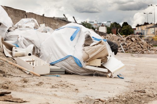 Professionals organizing a garage for clearance in Dalston