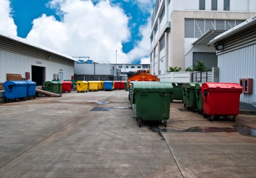 Workers managing builders waste clearance